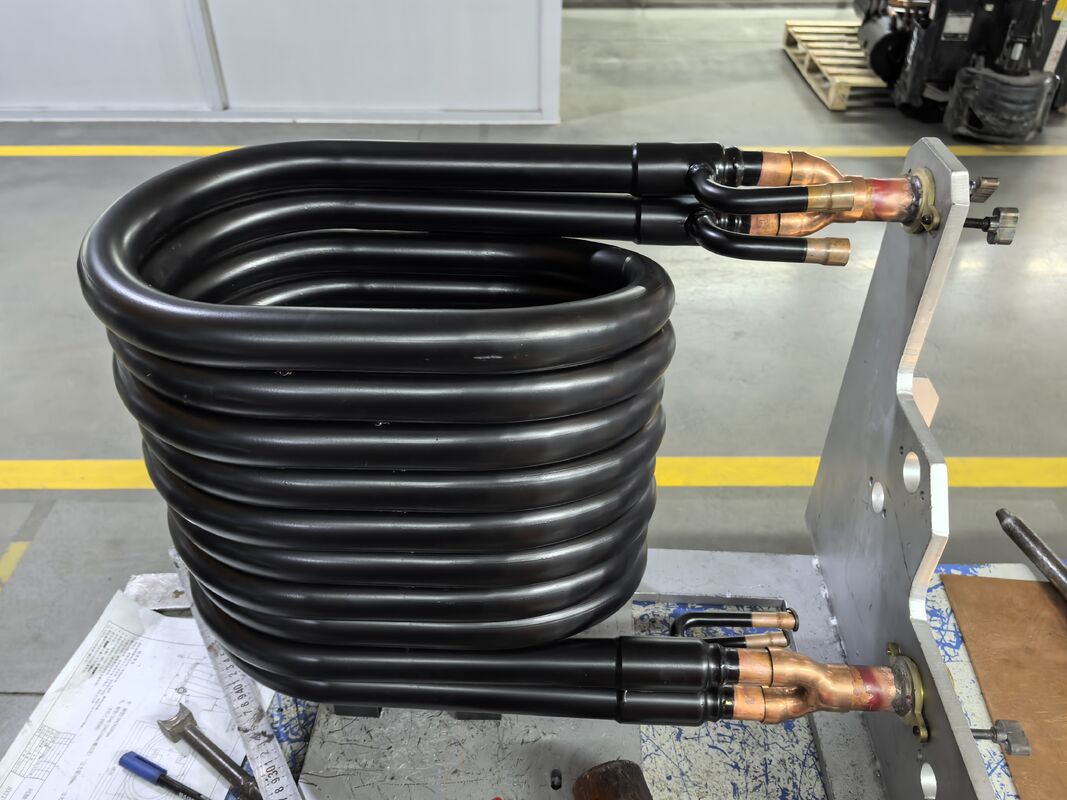 1 থেকে 10 মিটার টিউব দৈর্ঘ্য তাপ পাম্প কনডেনসার শিল্প তাপ বিনিময় জন্য উপযুক্ত শক্তিশালী 4mm প্লেট বেধ বৈশিষ্ট্য